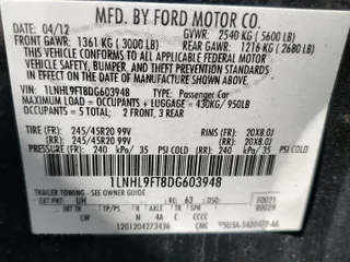 2013 Lincoln MKS EcoBoost with VIN 1LNHL9FT8DG603948, listed as a Copart auction lot 49908455 with 133,493 mi miles and Salvage title. Bid and sale history available at DreamBid. Image 13.