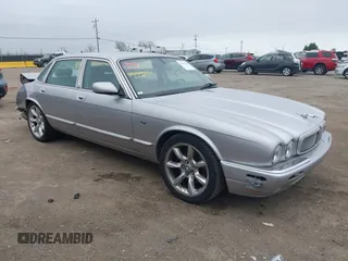 2000 Jaguar XJ with VIN SAJDA15BXYMF13991, listed as a IAAI auction lot 41623295 with 166,569 mi miles and . Bid and sale history available at DreamBid. Image 1.