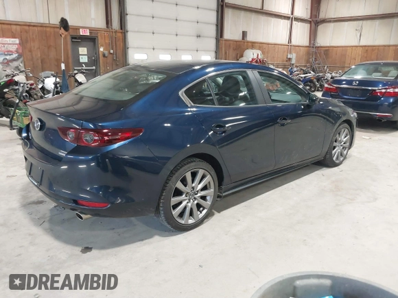 2021 Mazda 3 Select with VIN 3MZBPBBL3MM251893, listed as a IAAI auction lot 41854476 with 56,661 mi miles and . Bid and sale history available at DreamBid. Image 4.