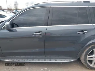 2015 Mercedes-Benz GL-Class GL 550 with VIN 4JGDF7DE0FA444489, listed as a IAAI auction lot 41716467 with 117,452 mi miles. Bid and sale history available at carsss.com. Image 14.