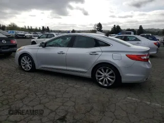 2012 Hyundai Azera z VIN KMHFH4JGXCA123949, wystawiony jako Copart lot #53499005 z przebiegiem 184 083 mil mil oraz Czysty tytuł • Clean title. Historia ofert i sprzedaży dostępna na DreamBid. Obrazek 2.