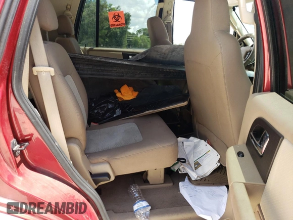 2006 Ford Expedition Special Service with VIN 1FMPU15566LA65080, listed as a Copart auction lot 69558824 with 128,749 mi miles and Salvage Title. Bid and sale history available at carsss.com. Image 12.