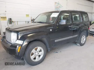 2011 Jeep Liberty Sport with VIN 1J4PN2GKXBW542168, listed as a IAAI auction lot 41984972 with 145,414 mi miles. Bid and sale history available at carsss.com. Image 2.