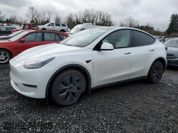 2024 Tesla Model Y Long Range with VIN 7SAYGDEE5RF115706, listed as a Copart auction lot 45002255 with 9,255 mi miles and Salvage Title. Bid and sale history available at DreamBid. Image 1.