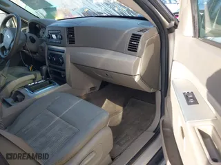 2007 Jeep Grand Cherokee Laredo with VIN 1J8GS48K77C545071, listed as a IAAI auction lot 41999998 with 144,966 mi miles. Bid and sale history available at carsss.com. Image 5.