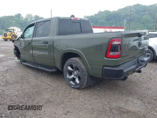 2021 Ram 1500 Lone Star with VIN 1C6SRFFT6MN695393, listed as a IAAI auction lot 42344282 with 12,796 mi miles and . Bid and sale history available at DreamBid. Image 3.