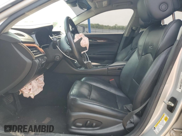 2014 Cadillac CTS Luxury AWD with VIN 1G6AX5SX5E0129143, listed as a Copart auction lot 58914015 with 131,465 mi miles and Salvage title. Bid and sale history available at DreamBid. Image 7.