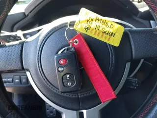 2014 Scion FR-S z VIN JF1ZNAA14E9708590, wystawiony jako IAAI lot #41278089 z przebiegiem 117 357 mil mil oraz . Historia ofert i sprzedaży dostępna na DreamBid. Obrazek 11.