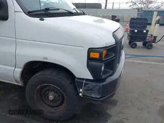 2014 Ford Econoline Cargo Commercial with VIN 1FTNE1EWXEDA18404, listed as a IAAI auction lot 42173934 with 188,301 mi miles and . Bid and sale history available at DreamBid. Image 6.