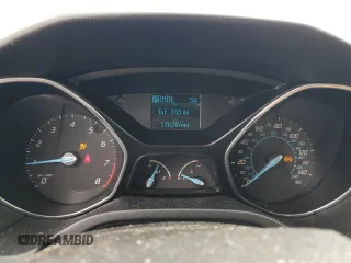 2012 Ford Focus SE z VIN 1FAHP3F23CL455216, wystawiony jako Copart lot #64894855 z przebiegiem 126 204 mil mil oraz Szkoda całkowita • Salvage title. Historia ofert i sprzedaży dostępna na DreamBid. Obrazek 9.
