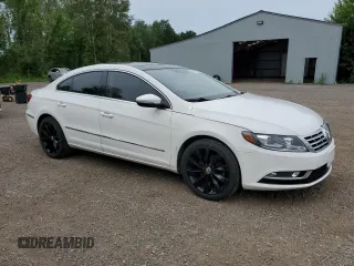 2013 Volkswagen CC Lux with VIN WVWRN7AN0DE507548, listed as a Copart auction lot 59938534 with 201,666 mi miles and Salvage Title. Bid and sale history available at carsss.com. Image 4.