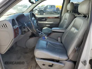 2005 GMC Envoy SLT with VIN 1GKET16M156182653, listed as a Copart auction lot 68747784 with 306,802 mi miles and Salvage Title. Bid and sale history available at DreamBid. Image 7.
