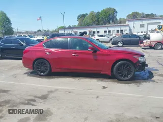 2015 Infiniti Q50 Premium with VIN JN1BV7AR2FM411095, listed as a IAAI auction lot 41932965 with 101,969 mi miles. Bid and sale history available at carsss.com. Image 14.
