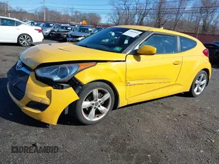 2012 Hyundai Veloster w/Black Int with VIN KMHTC6ADXCU042788, listed as a IAAI auction lot 41854662 with 90,500 mi miles. Bid and sale history available at carsss.com. Image 2.