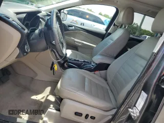 2015 Ford Escape Titanium z VIN 1FMCU0J98FUB06577, wystawiony jako Copart lot #61341175 z przebiegiem 66 206 mil mil oraz Szkoda całkowita • Salvage title. Historia ofert i sprzedaży dostępna na DreamBid. Obrazek 7.