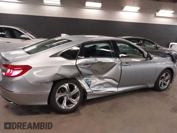 2018 Honda Accord EX with VIN 1HGCV1F46JA220710, listed as a IAAI auction lot 40693614 with 27,100 mi miles and . Bid and sale history available at DreamBid. Image 6.