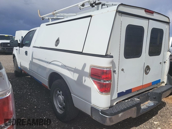 2013 Ford F-150 XL with VIN 1FTMF1CM7DKE57385, listed as a IAAI auction lot 42239910 with 114,245 mi miles and . Bid and sale history available at carsss.com. Image 18.