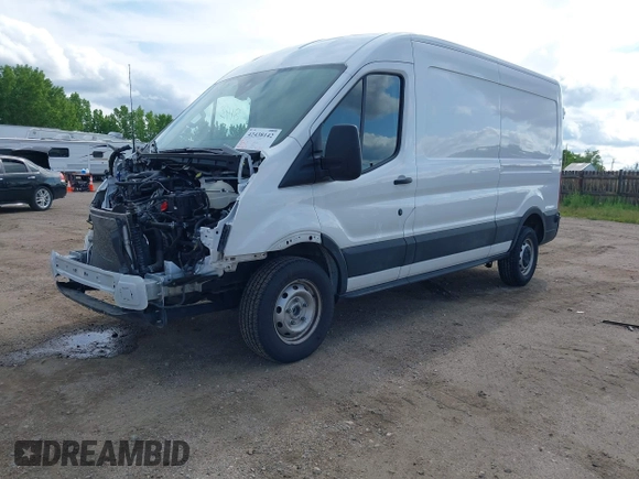 2024 Ford Transit Cargo z VIN 1FTBR1C84RKA32473, wystawiony jako IAAI lot #42438142 z przebiegiem 40 817 mil mil oraz . Historia ofert i sprzedaży dostępna na DreamBid. Obrazek 2.