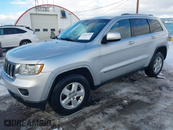 2011 Jeep Grand Cherokee Laredo with VIN 1J4RR4GG7BC584500, listed as a IAAI auction lot 41383355 with 161,722 mi miles. Bid and sale history available at carsss.com. Image 17.