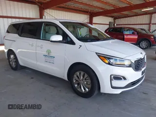 2021 Kia Sedona LX with VIN KNDMB5C15M6669588, listed as a IAAI auction lot 41757129 with 14,738 mi miles. Bid and sale history available at carsss.com. Image 1.