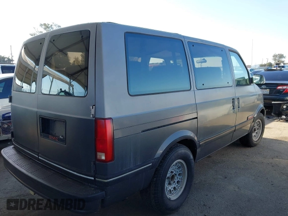 1991 GMC Safari z VIN 1GKDM19Z2MB530997, wystawiony jako IAAI lot #42134837 z przebiegiem 195 085 mil mil oraz . Historia ofert i sprzedaży dostępna na DreamBid. Obrazek 4.