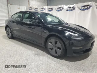2023 Tesla Model 3 с VIN 5YJ3E1EA2PF432462, выставлен на аукционе Copart как лот 58579035 с пробегом 126 482 миль миль и Списание • Salvage title. История ставок и продаж доступна на DreamBid. Изображение 4.