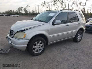 1999 Mercedes-Benz M-Class with VIN 4JGAB72EXXA131890, listed as a IAAI auction lot 41721001 with 168,969 mi miles. Bid and sale history available at carsss.com. Image 2.