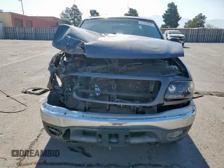 2002 Ford F-150 XL with VIN 1FTPX18L32NB65156, listed as a Copart auction lot 61418955 with 176,622 mi miles and Salvage title. Bid and sale history available at DreamBid. Image 5.