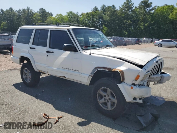 1998 Jeep Cherokee Sport with VIN 1J4FJ68S8WL116368, listed as a Copart auction lot 59228735 with 113,546 mi miles and Salvage title. Bid and sale history available at DreamBid. Image 4.