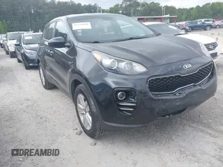 2018 Kia Sportage LX z VIN KNDPMCAC8J7330507, wystawiony jako IAAI lot #42436610 z przebiegiem 87 159 mil mil oraz . Historia ofert i sprzedaży dostępna na DreamBid. Obrazek 1.