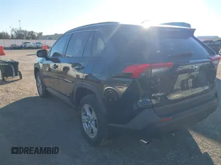2019 Toyota RAV4 XLE with VIN JTMW1RFV1KD002799, listed as a IAAI auction lot 40887562 with 75,016 mi miles. Bid and sale history available at carsss.com. Image 3.
