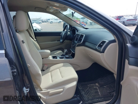 2020 Jeep Grand Cherokee Laredo E with VIN 1C4RJEAG2LC284912, listed as a IAAI auction lot 42114881 with 86,579 mi miles and . Bid and sale history available at DreamBid. Image 5.