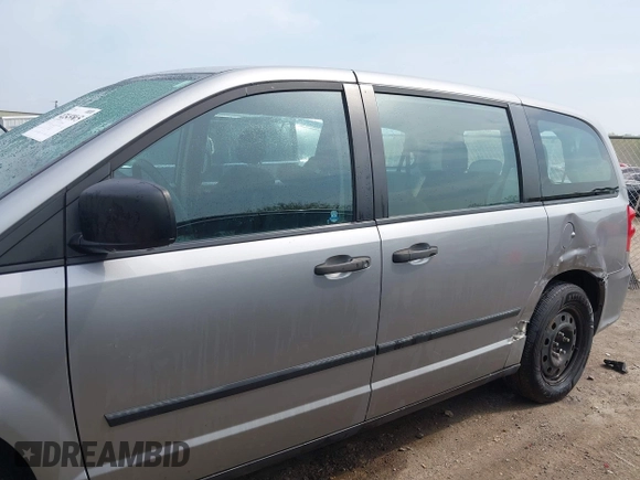 2016 Dodge Grand Caravan SE with VIN 2C4RDGBG5GR251689, listed as a IAAI auction lot 42149865 with 137,410 mi miles and . Bid and sale history available at DreamBid. Image 14.