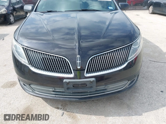 2013 Lincoln MKS with VIN 1LNHL9DK1DG608872, listed as a IAAI auction lot 42672243 with 175,935 mi miles and . Bid and sale history available at DreamBid. Image 6.