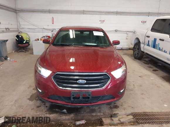 2015 Ford Taurus SEL with VIN 1FAHP2E82FG124009, listed as a IAAI auction lot 42323744 with 159,196 mi miles and . Bid and sale history available at DreamBid. Image 12.
