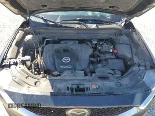 2019 Mazda CX-5 Grand Touring with VIN JM3KFBDM7K0563198, listed as a Copart auction lot 54723494 with 132,126 mi miles and Clean Title. Bid and sale history available at carsss.com. Image 12.