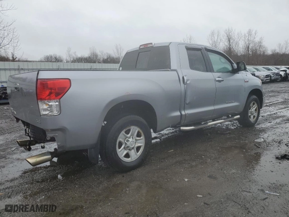 2010 Toyota Tundra 4WD Truck with VIN 5TFUY5F10AX102267, listed as a Copart auction lot 49061645 with 214,105 mi miles and Clean Title. Bid and sale history available at carsss.com. Image 3.