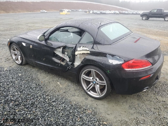 2011 BMW Z4 sDrive35is with VIN WBALM1C59BE633291, listed as a Copart auction lot 86403324 with NaN miles and Salvage Title. Bid and sale history available at carsss.com. Image 2.