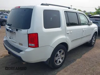 2011 Honda Pilot Touring z VIN 5FNYF4H9XBB003469, wystawiony jako IAAI lot #42369323 z przebiegiem 201 958 mil mil oraz . Historia ofert i sprzedaży dostępna na DreamBid. Obrazek 4.
