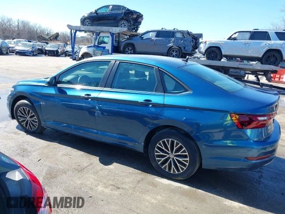 2021 Volkswagen Jetta S z VIN 3VWC57BU0MM009093, wystawiony jako IAAI lot #41643969 z przebiegiem 54 723 mil mil oraz . Historia ofert i sprzedaży dostępna na DreamBid. Obrazek 14.
