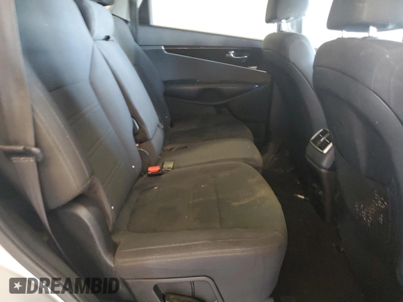 2019 Kia Sorento LX z VIN 5XYPG4A54KG480732, wystawiony jako Copart lot #87833135 z przebiegiem 102 219 mil mil oraz Szkody całkowita. Historia ofert i sprzedaży dostępna na DreamBid. Obrazek 12.