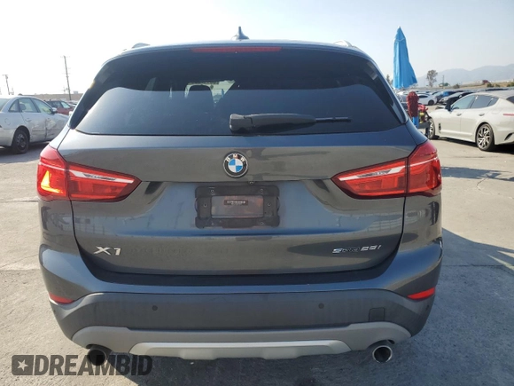2018 BMW X1 sDrive28i with VIN WBXHU7C35J5L09783, listed as a Copart auction lot 55147935 with 37,114 mi miles and Salvage Title. Bid and sale history available at DreamBid. Image 6.