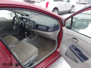 2010 Honda Insight LX with VIN JHMZE2H51AS004907, listed as a IAAI auction lot 41259182 with 76,494 mi miles. Bid and sale history available at carsss.com. Image 5.