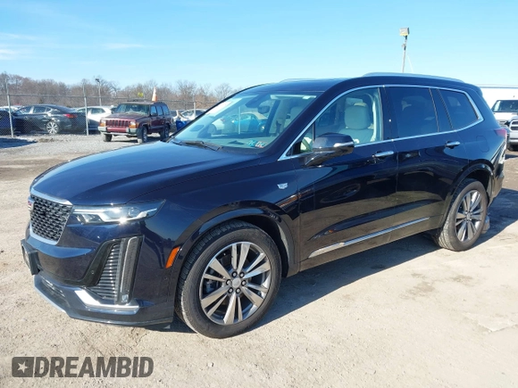 2021 Cadillac XT6 Premium Luxury z VIN 1GYKPDRS8MZ175544, wystawiony jako IAAI lot #41591775 z przebiegiem 39 290 mil mil oraz . Historia ofert i sprzedaży dostępna na DreamBid. Obrazek 2.