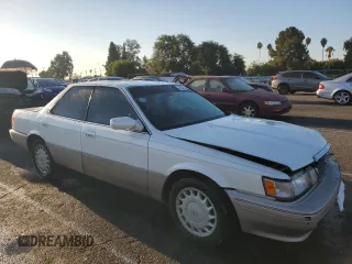 1990 Lexus ES z VIN JT8VV22T5L0096463, wystawiony jako Copart lot #70032254 z przebiegiem 127 414 mil mil oraz Szkoda całkowita • Salvage title. Historia ofert i sprzedaży dostępna na DreamBid. Obrazek 4.