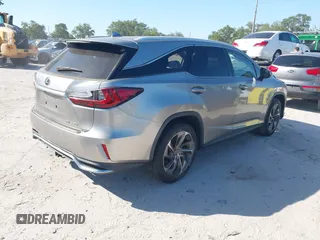 2019 Lexus RX 350L Premium z VIN JTJGZKCA9K2013385, wystawiony jako IAAI lot #42072200 z przebiegiem Nie podano mil oraz . Historia ofert i sprzedaży dostępna na DreamBid. Obrazek 4.