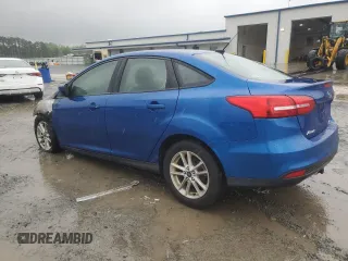2018 Ford Focus SE z VIN 1FADP3FE6JL227653, wystawiony jako Copart lot #56827585 z przebiegiem Nie podano mil oraz Szkoda całkowita • Salvage title. Historia ofert i sprzedaży dostępna na DreamBid. Obrazek 2.