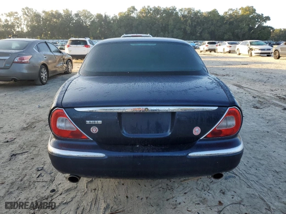 2007 Jaguar XJ with VIN SAJWA79B37SH18598, listed as a Copart auction lot 76253764 with 0 mi miles and Salvage Title. Bid and sale history available at carsss.com. Image 6.