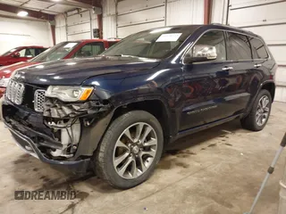 2017 Jeep Grand Cherokee Overland with VIN 1C4RJFCG3HC693897, listed as a IAAI auction lot 41636323 with 105,575 mi miles. Bid and sale history available at carsss.com. Image 18.