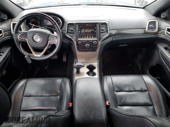 2015 Jeep Grand Cherokee Overland with VIN 1C4RJFCT2FC762573, listed as a Copart auction lot 59123275 with 229,128 mi miles and Salvage title. Bid and sale history available at DreamBid. Image 8.